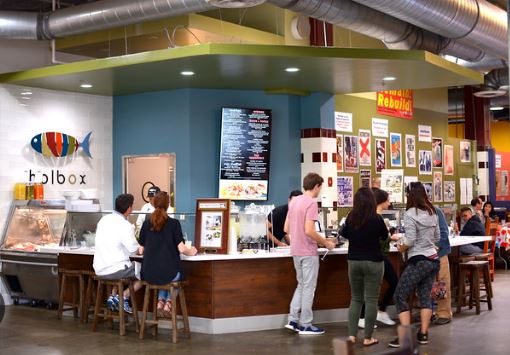 Vibrant Mexican restaurant interior packed with diners